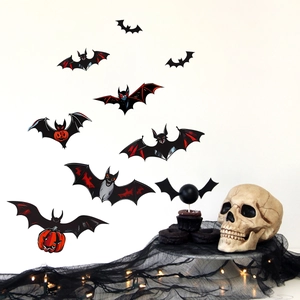 Detailed view of Halloween bat wall decals with red pumpkin patterns and 3D flight effects