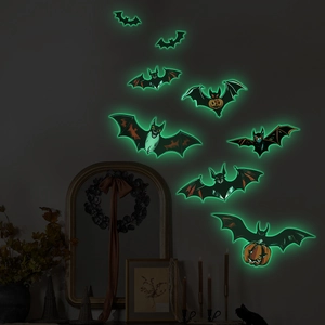 Luminous Halloween bat wall stickers with glowing green outlines in a dark room decor