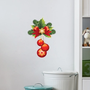 Christmas wall decal featuring holly leaves, red bows, and snowflake ornaments on white wall
