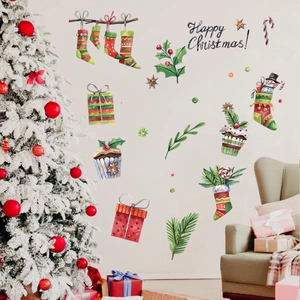 Close-up of watercolor Christmas stocking wall stickers with Happy Christmas decals