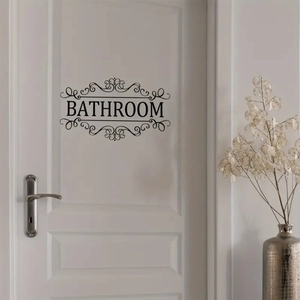 Vintage style black vinyl Bathroom wall sticker with elegant floral frame on white door