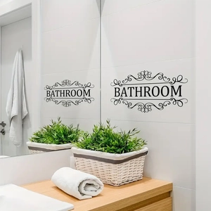 Detail of black vinyl Bathroom wall sticker with elegant floral patterns on white tiles