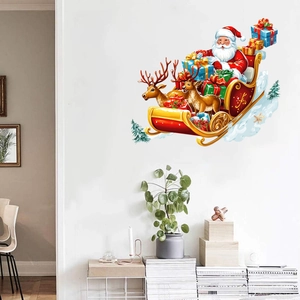 Close-up of Santa Claus on a reindeer sleigh wall sticker with gift boxes decor