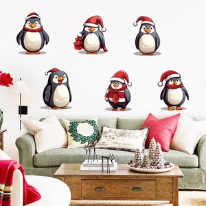 Detailed view of six cartoon Christmas penguin wall stickers for holiday home decoration
