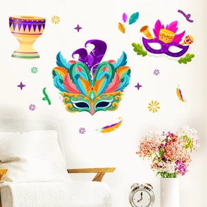 Detail view of Carnival wall stickers with colorful masks and tambourine on a white wall