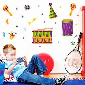 Detail of colorful Carnival wall stickers featuring drums, masks and party hats in a kid room