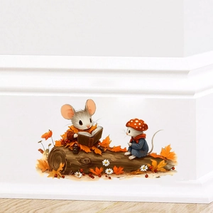 Detail of cute mouse wall stickers featuring fairy tale illustrations on a white wall
