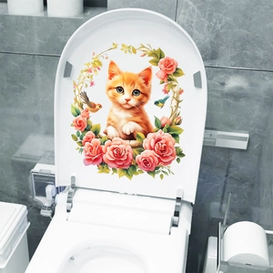 Macro detail of waterproof toilet lid sticker featuring an orange cat and pink rose wreath