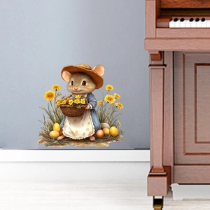 Detail of cute mouse wall sticker with flower basket on a light blue wall background