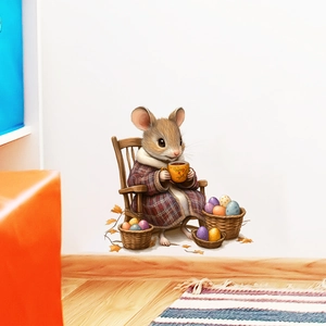 Close-up of mouse wall sticker holding coffee cup near baskets of colorful Easter eggs