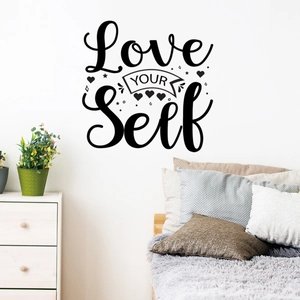 Detail of Love Your Self black wall sticker decal in a cozy bedroom setting
