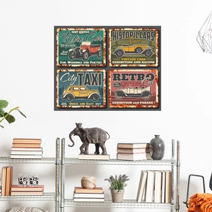 Detail of vintage car tin signs with rusty edges displayed on a white wall