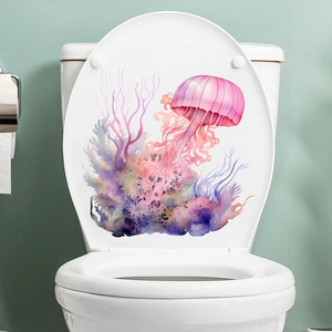Dettaglio di adesivi murali con meduse rosa e coralli per decorare il bagno moderno