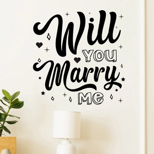 Detail of Will You Marry Me black wall sticker with stars and hearts on a white wall