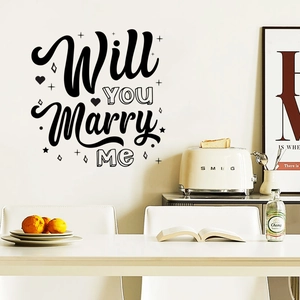 Detail of Will You Marry Me wall sticker in elegant black script for romantic home decor