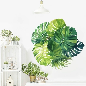 Macro detail of tropical monstera leaf wall stickers with vibrant green textures