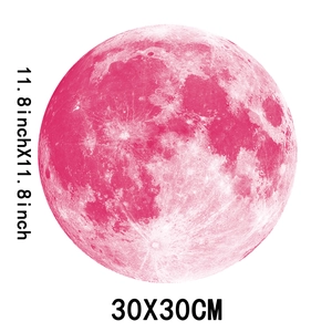 Detailed view of pink moon wall sticker with 30cm size info and realistic surface texture