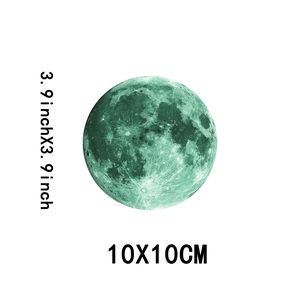 Luminous moon wall sticker detail showing 10x10cm size and green lunar texture