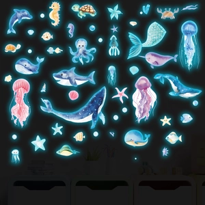 Luminous ocean animal wall stickers with whale and jellyfish in dark glow effect