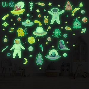 Glow-in-the-dark astronaut and planet wall stickers for kids' space-themed bedroom