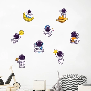 Glow-in-the-dark astronaut wall stickers set with planets for kids room decoration