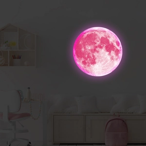 Macro detail of a glowing pink 3D moon wall sticker with realistic lunar crater textures