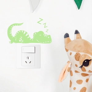 Glow-in-the-dark sleeping dinosaur wall sticker for nursery light switch decoration
