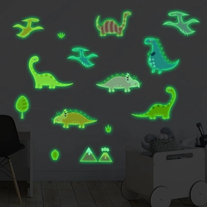 Stickers muraux dinosaures fluorescents avec volcan brillant dans une chambre d'enfant