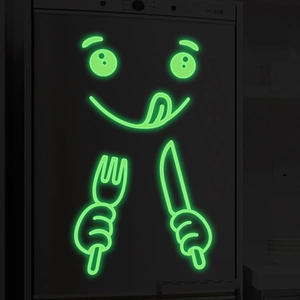Glow in the dark kitchen wall sticker featuring a cute smiling face with cutlery