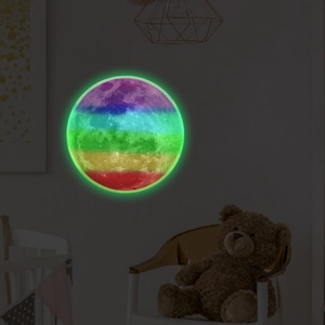 Luminous rainbow moon wall sticker showing soft glow effects in a dark children's room