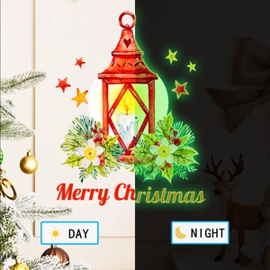 Glow-in-the-dark Christmas wall decal showing day and night luminous effect with lantern design