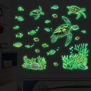 Luminous ocean wall stickers featuring sea turtles, coral reefs, and tropical fish glow