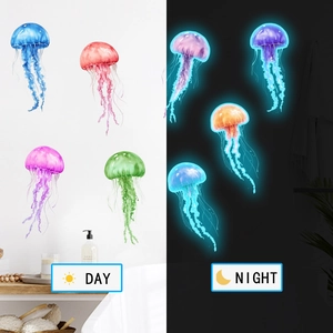 Watercolor glowing jellyfish wall decals showing day and night fluorescence effect