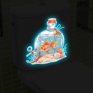 Glow in the dark fish tank sticker showing bioluminescent blue ocean scene and a goldfish