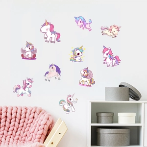 Luminous unicorn wall stickers set in pink and purple tones for kids' bedroom decoration