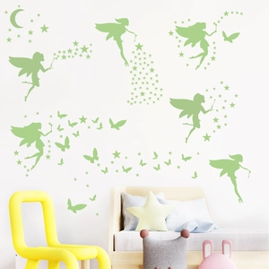 Luminous wall stickers set featuring green fairies stars and moon for nursery decor