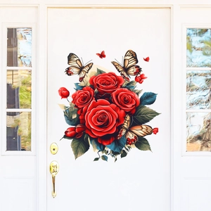 Detail view of red rose and vintage butterfly wall stickers on a white interior door