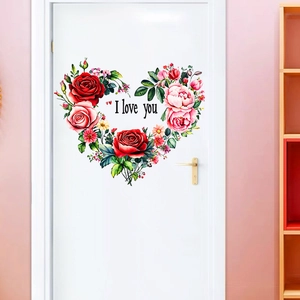 Close-up of heart-shaped floral wall decal with red roses and I Love You text on door