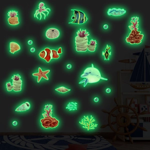 Luminous marine life wall decals featuring dolphins and fish glowing in the dark