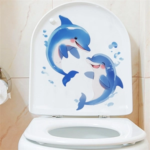 Stickers muraux phosphorescents avec deux dauphins bleus pour décor de salle de bain