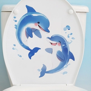 Autocollants muraux lumineux avec deux mignons dauphins bleus pour décor de toilette