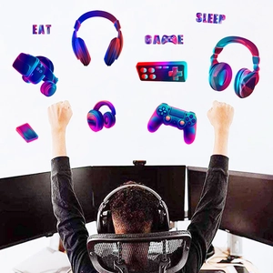 Neon video game wall decals featuring controllers, headsets and VR icons for kids room