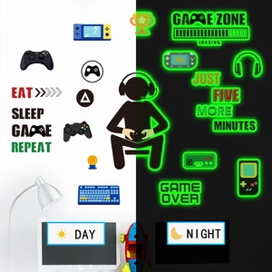 Glow-in-the-dark gamer wall decals showing day and night contrast with controller icons