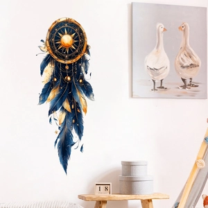 Detail of dream catcher wall sticker with sun pattern and blue gold feathers in a cozy room