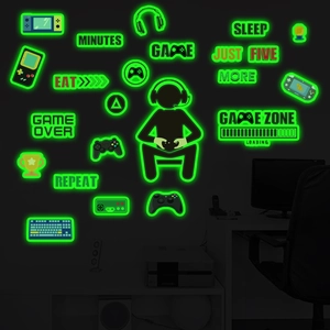 Luminous gaming wall stickers featuring controllers and gamer quotes in bright neon green glow