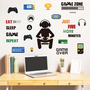 Glow-in-the-dark gaming wall decals with game zone lettering and gamer silhouettes