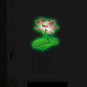 Glow-in-the-dark lotus flower wall sticker for light switch decor with green luminous effect