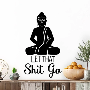 Zen black Buddha wall decal with 'Let That Shit Go' text in a minimalist living room