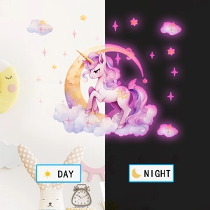 Glow in the dark unicorn wall decals showing day and night visual effect comparison