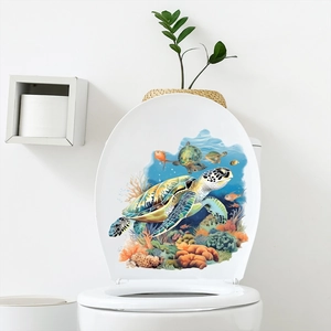 Glow-in-the-dark sea turtle bathroom sticker with colorful coral reef and tropical fishes